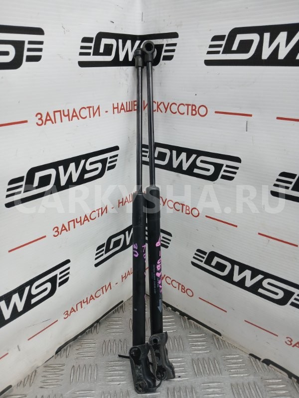 Амортизатор багажника Toyota Vitz 