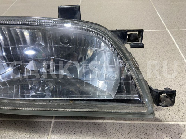 Фара передняя правая Toyota Tercel 1999 г Toyota Tercel оригинальный номер 16158