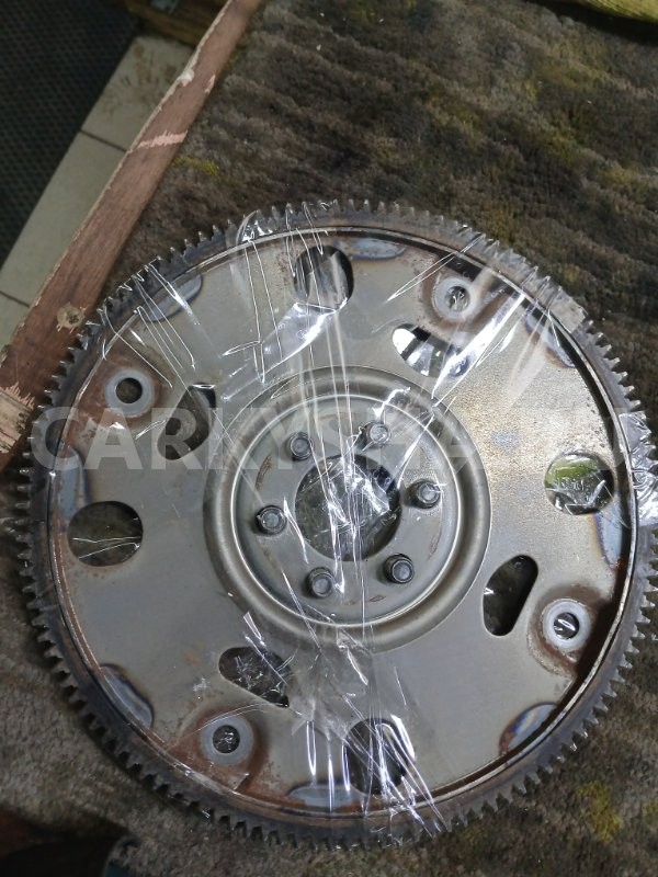 Маховик Nissan Tiida 