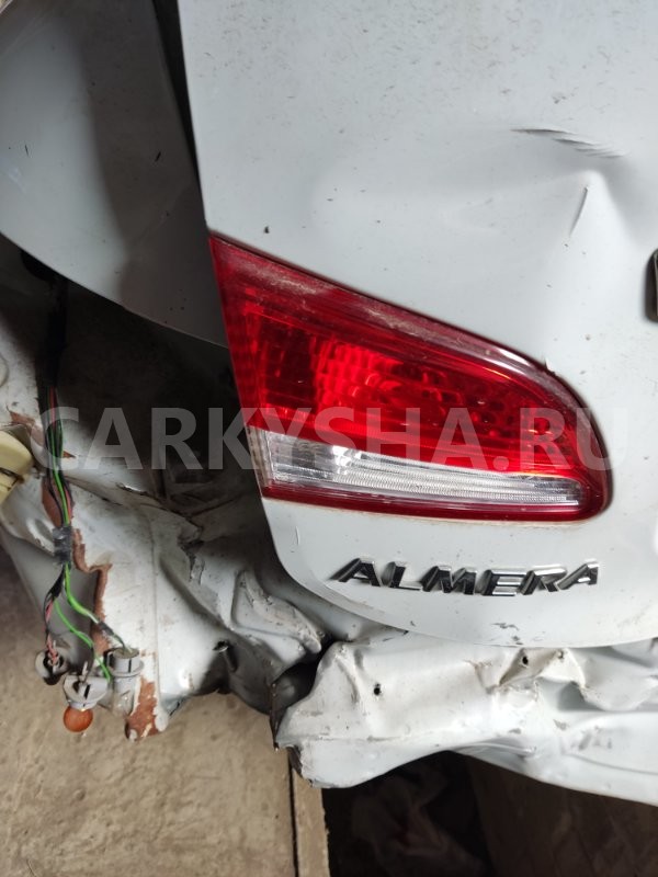 Фонарь в крышку багажника Nissan Almera 