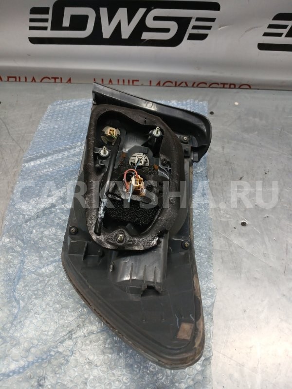 Фонарь стоп сигнала левый Mazda CX-7 