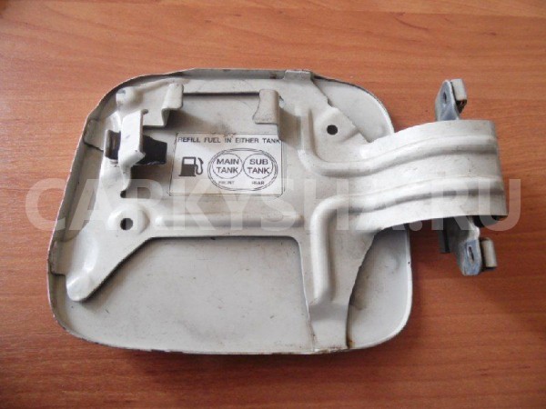 Лючок бензобака Toyota Land Cruiser 100 (1998—2002) Toyota Land Cruiser оригинальный номер 7735060061