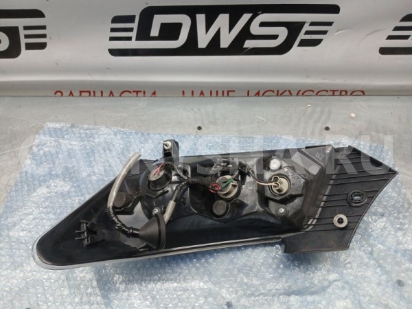 Фонарь стоп сигнала левый Toyota bB 