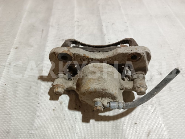 Суппорт тормозной передний левый Mitsubishi Galant оригинальный номер MB928410