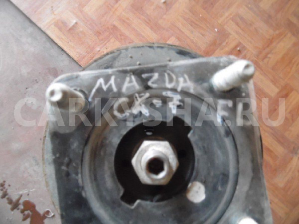 Амортизатор подвески Mazda CX-7 I (2006—2009) Mazda 2 оригинальный номер 2A20733-B