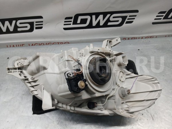 Фара Toyota Raum 