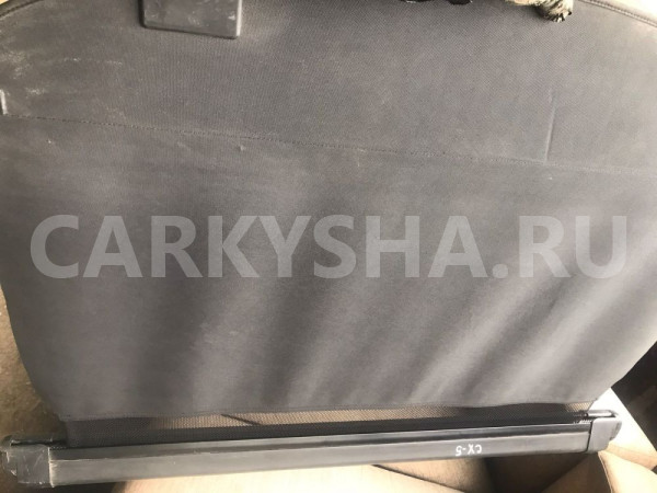 Шторка багажника Mazda CX-5 I (2011—2015) Mazda 2 оригинальный номер KD456834XA02