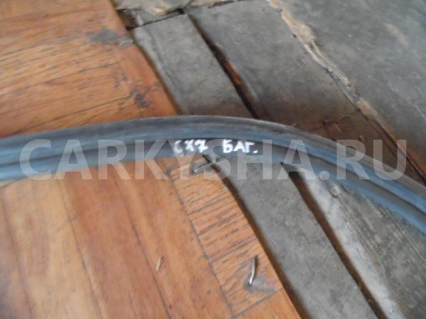 Уплотнитель багажника Mazda CX-7 I (2006—2009) Mazda 2 оригинальный номер EG2162761A