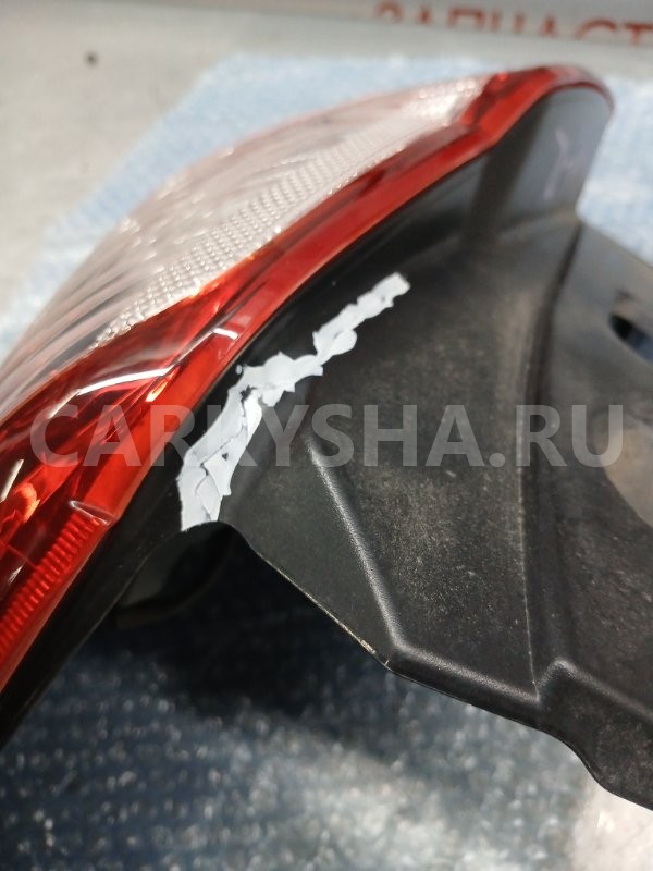 Фонарь стоп сигнала левый Subaru Exiga 