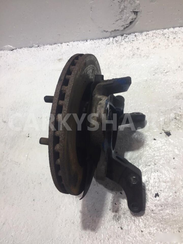 Поворотный кулак передний левый Nissan March K11E Nissan March 