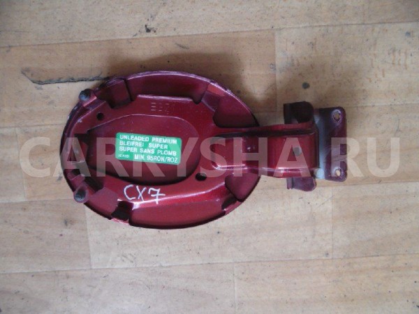 Лючок бензобака Mazda CX-7 I (2006—2009) Mazda 2 оригинальный номер EG2142410B