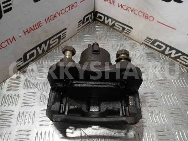 Суппорт тормозной Nissan Primera 