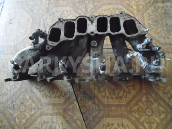 Впускной коллектор Land Cruiser 100 1FZ-FE низ Toyota Land Cruiser оригинальный номер 1711166040