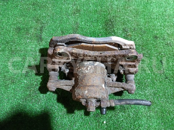 Суппорт тормозной передний левый Toyota Avensis 