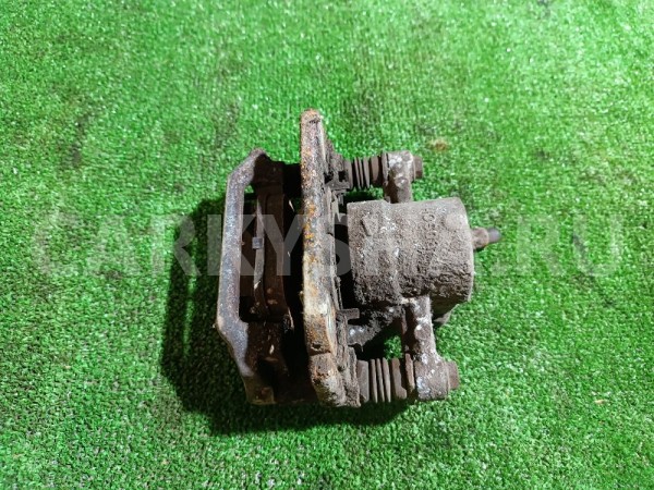 Суппорт тормозной задний правый Toyota Avensis 