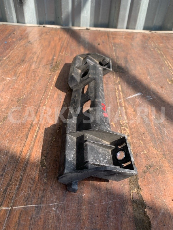 Кронштейн фары Mazda CX-7 2006-2012, левый Mazda CX-7 