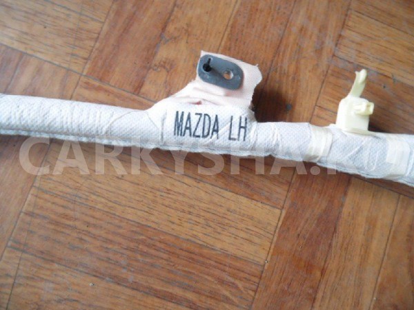 Подушка безопасности боковая (шторка) Mazda CX-7 I (2006—2009) Mazda 2 оригинальный номер EG2157KN0F