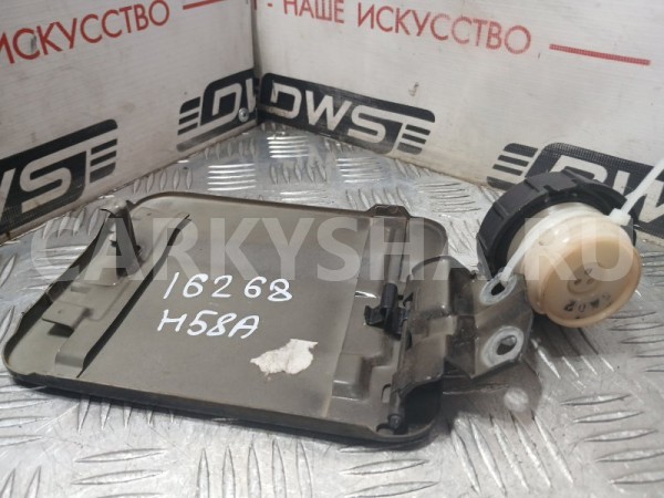 Лючок топливного бака Mitsubishi Pajero 