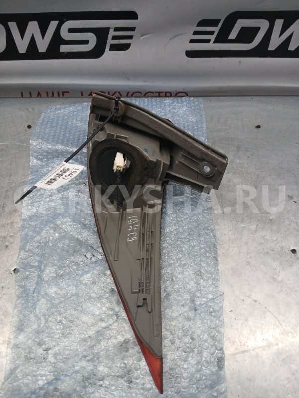 Фонарь стоп сигнала левый Toyota Estima 
